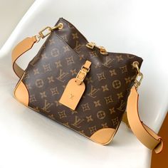 Louis Vuitton launched a new Odeon small handbag in the autumn and winter of 2020. The Monogram canvas is complemented by a zipper design with ample storage space, and the leather nameplate and reinforced leather corners continue the brand heritage. Adjustable shoulder strap for comfortable shoulder or cross-body wear.

Size: 24.0 x 22.0 x 8.0 cm (LxHxW)
• Monogram coated canvas
• Semi-aged calfskin trim
• Textile lining
• metallic parts
• Leather corners
• Double zip closure
• External New Louis Vuitton Handbags, Louis Vuitton Odeon, Cheap Louis Vuitton Bags, Louis Vuitton Yayoi Kusama, Cheap Louis Vuitton Handbags, Louis Vuitton Limited Edition, Large Cosmetic Bag, Lv Purse, Used Louis Vuitton