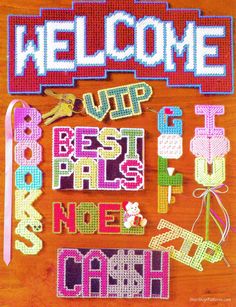 the welcome sign is made out of plastic beads