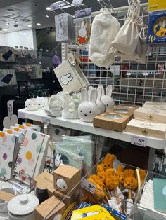 there are many items for sale in the store, including teddy bears and other things