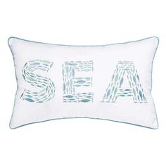 an embroidered pillow with the word sea on it