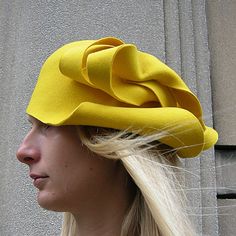 High quality felt hat made from 100% natural wool fabric.  An asymmetric pattern in colors and design according to preference.  Appropriate for casualwear, weddings, parties, or funeral.  It can be worn as you please:  sideways or backward. Wool Party Hat With Short Brim, Party Fedora Hat In Felt, Fitted Wool Cloche Hat With Curved Brim, Brimmed Felt Hat For Parties, Wool Brimmed Hat For Party, Fitted Wool Felt Hat For Kentucky Derby, Wool Brimmed Party Hat, Elegant Winter Felt Hat, Elegant Felt Hat For Party