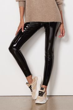 Faux Patent Leather Legging - Madison's Niche Sleek Stretch Shiny Pants, Shiny Sleek Stretch Leggings, Sleek Shiny Stretch Leggings, Sleek Shiny Leather Pants For Fall, Sleek Shiny Black Bottoms, Trendy Black Shiny Leather Pants, Trendy Shiny Black Leather Pants, Shiny Stretch Leggings For Fall, Fall Shiny Stretch Leggings