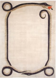 a white area rug with an ornate border in the shape of a rectangle on top of it