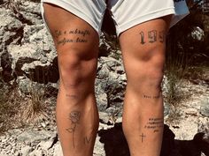 the legs of a person with tattoos on them and their names written in cursive writing