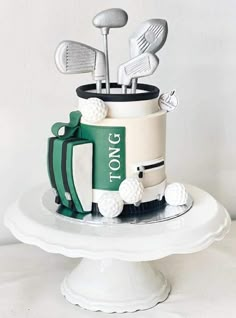 a birthday cake with golf related items on it