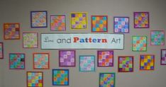 a bulletin board with colorful squares on it and the word's end pattern art