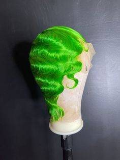 This high quality custom wig is made using a Body Wave textured Wig with a 13 by 4 frontal space. Wig comes bleach knotted, plucked and styled as picture. Bands are included for Glue-less install options.  Medium wig cap (22” circumference)Color: Lime green, Lavender Good to know about your high quality hairPlease note that intense exposure to heat and chemicals may potentially damage and alter the texture of your locks, so please protect your hair and always consult with a professional.What to Soulaan Culture, Green Hair Extensions, Medium Wig, Wigs Collection, Short Cut Wigs, Finger Wave, Brazilian Hair Wigs, Green Wig, Green Lavender