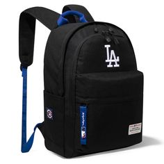 MLB OFFICIAL BASEBALL BACKPACK Light weight backpack , suitable for sports events, school, travelling and daily use. Made of waterproof polyester, this backpack has: Embroidered Los Angeles Dodgers logo Exterior front zipper pocket 2 main zippered compartments 2 side pockets Top carry handle (3.5") Front main compartment with organizer pockets Padded laptop compartment Quality construction, fully padded back panel and shoulder straps for cushioned comfort 14"" x 6" x 18" Casual Backpack For Sports Events, Black College Bag For Back To School, Casual Nylon College Backpack, Sporty Backpack For College And Back To School, Back To School Black College Bag, Sporty Backpack For Back To School And Sports Events, Back To School Sports Backpack, Black Bags For Sports With School Spirit Style, Sporty Softback Backpack For Students