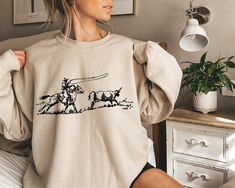 Cowboy Roping Western Sweatshirt  Cowboy Roping Hoodie  American Western Sweatshirt  Rodeo Gift Shirt  Country Girl Sweatshirt Easy 30 day return policy Cowboy Roping, Rodeo Gifts, Western Sweatshirts, American Western, Cowboys Shirt, Jumpsuits And Romper, Long Sleeve Jumpsuit, Long Jumpsuits, Girl Sweatshirts