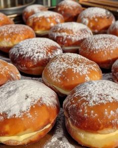 many donuts are covered with powdered sugar