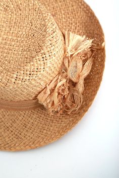 "Vintage 1990s natural straw sun hat with a wide natural woven straw + jute band bow Measures 23\" around inside Brim: 3\" wide 4\" tall Maker: N/A" Woven Toquilla Straw Hat Bands For Summer, Natural Handwoven Fedora For Spring, Handwoven Palm Leaf Panama Hat For Spring, Handwoven Natural Fedora For Spring, Spring Handwoven Panama Hat From Palm Leaf, Spring Handwoven Panama Hat, Spring Handwoven Palm Leaf Panama Hat, Brown Straw Hat Bands For Summer, Handwoven Straw Brimmed Fedora