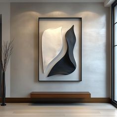 an abstract art piece hangs on the wall above a bench in a modern living room