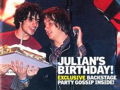 two young men standing next to each other in front of a cake on the cover of people magazine