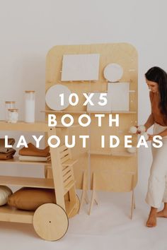 a woman standing in front of a wooden booth with text overlay that reads 10x5 booth layout ideas