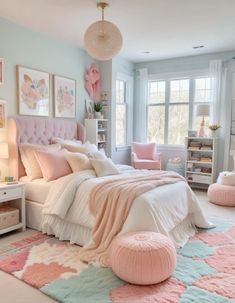 a bedroom decorated in pastel colors with pink accents