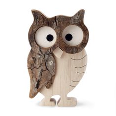 an owl figurine is made out of wood