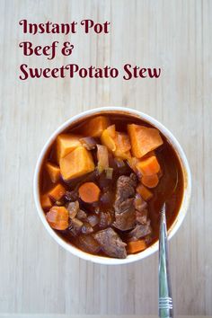 a white bowl filled with beef and sweet potato stew