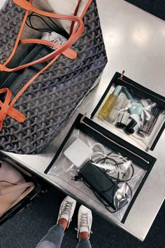 Travel Carryon Essentials, Travel Bag Essentials Aesthetic, Designer Travel Bag, Travel Handbag Essentials, Nyc In April, Carryon Essentials, Celine Belt Bag, Goyard Tote, Carryon Bag