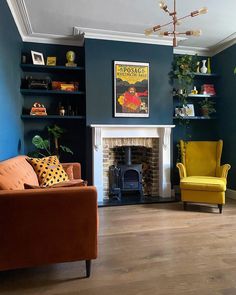 a living room filled with furniture and a fire place