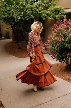 Get ready to spice up your wardrobe with our Pumpkin Spice Skirt! This tiered midi skirt not only adds a touch of whimsy to any outfit, but the wave trim adds extra charm and movement. Perfect for fall festivities or everyday wear. (Pumpkin-spice latte not included.) 100% Cotton Prairie Skirt, Fall Festivities, Tiered Midi Skirt, Fall Festival, The Wave, Cayman Islands, Spice Up, Ghana, Pumpkin Spice