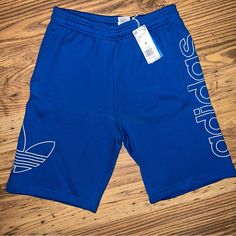 Nwt Blue Adidas Men’s Shorts Aeroready Moisture-Absorbing Technology And Iconic Adidas Detailing Of These Essentials Shorts From Adidas. Comes With Side Pockets And A Back Pocket. Made With 100% Cotton Adidas Relaxed Fit Bottoms For Summer, Adidas Cotton Bottoms For Summer, Adidas Summer Bottoms With Pockets, Adidas Shorts With Pockets For Spring, Blue Short Leg Bottoms For Streetwear, Casual Blue Short Pants, Adidas Bottoms For Summer Streetwear, Adidas Casual Shorts, Adidas Relaxed Fit Short Bottoms