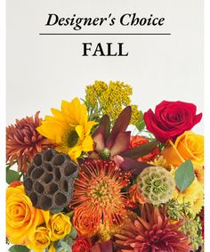 the designer's choice fall bouquet is shown in red, yellow and orange flowers