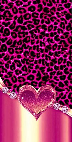 a pink leopard print background with a heart on the bottom and gold glitters in the middle