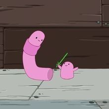 an animated pink worm and its baby in the street