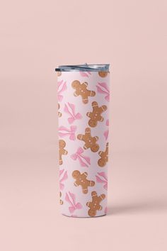 a pink and brown teddy bear pattern tumbler cup on a pink background with the lid open