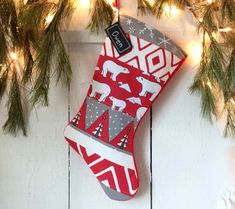 a stocking hanging from a christmas tree