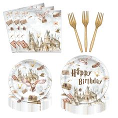 a set of paper plates and forks with an image of hogwart's castle on them