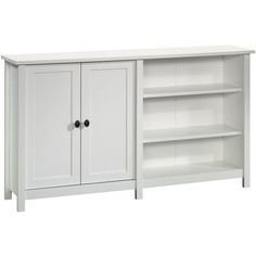 a white cabinet with two doors and shelves