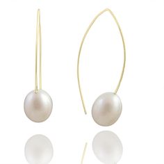 Gold, Silver & Pearl Earrings - Fresh water pearls on V shaped sterling silver wire.  Fashionable and great for day or evening wear.  Freshwater pearls are irregular and vary slightly in quality.  Gold filled wire hand fabricated.  Approximate length is 1 1/2 inches from ear lobe. Pearl White Minimalist 14k Gold-filled Earrings, Gold Wire Wrapped 14k Gold-filled Pearl Earrings, White 14k Gold-filled Drop Pearl Earrings, 14k Gold-filled Pearl Drop Earrings In Pearl White, Elegant 14k Gold-filled Pearl White Pearl Earrings, Silver Pearl Earrings, Artful Home, Fresh Water Pearls, Water Pearls