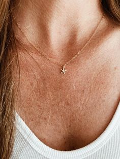 "All chains are 14K Gold Filled, does not tarnish and are water/sweat resistant. ITEM DETAILS: Chain - 14k Gold Filled 16\", 18\" or 20\" Pendant - 14K Gold Filled Starfish (Necklace Pictured on Model is 16\") Listing is for one necklace. Layered necklace photos are for inspiration only ❤️ Check out our Etsy Store to create a layered look. FREE SHIPPING - Items are made to order. Order time takes 3-5 business days. LJ Gold Designs is based in Southern California. We are two best friends who love natural beauty, nature, culture and travel. All of these passions inspire our jewelry designs." Gold Starfish Charm Necklace, Sea Star Necklace, Dainty Gold Starfish Necklace, Minimalist Gold Jewelry With Starfish Charm, Gold Starfish Shaped Dainty Jewelry, Dainty Starfish Gold Jewelry, Dainty Gold Starfish Jewelry, Minimalist Starfish Charm Jewelry, Gold Necklace Dainty