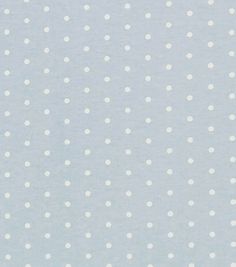 a blue and white polka dot fabric