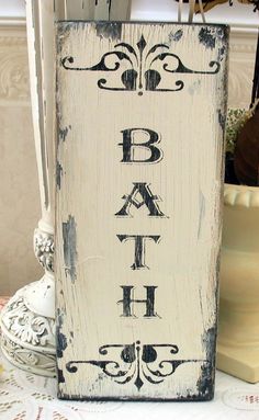 a wooden sign with the word bah on it