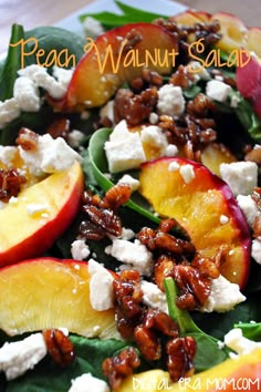 a salad with peaches, feta cheese and walnuts on top is shown