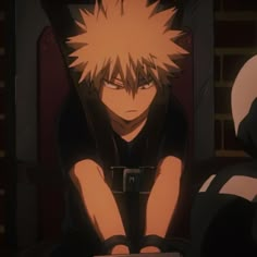 an anime character sitting down with his hands on his knees