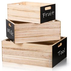 three wooden boxes with chalk writing on them that say fruit, milk, and tooth