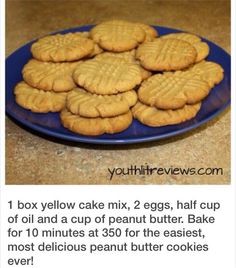 a blue plate filled with cookies on top of a counter