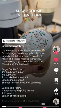 someone is holding up a drink with sprinkles on it and the text reads sugar cookie latte at home