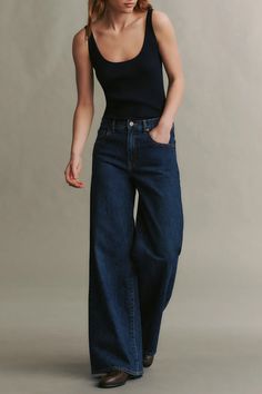 Mid-rise, wide leg Jean in vintage inspired dark wash denim. The Tiny Dancer is relaxed at the hip, wide at the leg, and features a five-pocket style, detailed with nail head rivet hardware. Complete with a zip-fly, belt loops, and a shank button at the waistband. Pants For Belly, Dark Wash Vintage Jeans, Dark Denim Jeans Outfit Winter, Dark Denim Wide Leg Jeans, Vintage Latina Fashion, Dancer Off Duty Style, Dark Wash Wide Leg Jeans, Wide Leg Dark Jeans Outfit, Dark Wash Wide Leg Jeans Outfit