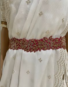 "Areya collections offers unique collection of items. Beautiful Maggam/embroidery work cloth Indian ethnic-wear waist belt (Vaddanam) for Adults Pink, Blue, Light Green, Silver/White and Green Color- All have 3 different size settings. Expandable. Fits waist from 30 to 46 inches Width approx. 2\". Excellent accessory for women Indian wear (Saree, Half-saree,lehenga or dresses) for parties, weddings and events. Looks very pretty and attractive. This fabric waist belt is a perfect match on Wedding Sarees & Lehanga Cloth Vadanam Vaddanam Vadanalu Vadanallu Ottyanam Kardhani Kamarbandh For ladies Suitable to wear on Saree, Half-saree, nice frocks or long frocks or Lehenga's or Pattu Langa or Langa Voni or western dresses This embroidery Saree belt can be a perfect gift for your love Valentine Work Belts For Women Saree, Waist Belt Embroidery Designs, Cloth Waist Belt For Saree, Saree Belt Designs, Modern Blouse Designs, Langa Voni, Saree With Belt, Indian Pink, Half Saree Lehenga