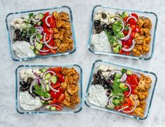 three glass containers filled with different types of food