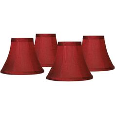 three red lampshades on a white background