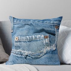 an old pair of jeans with holes in the back pocket throw pillow