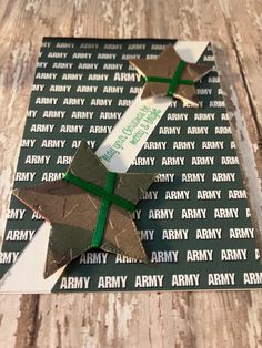 an army themed gift wrapped in brown paper