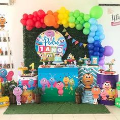 a birthday party with balloons and decorations