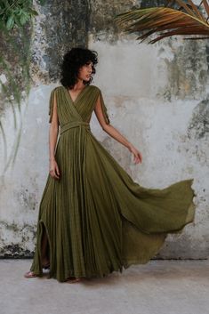 The elegance of the best-selling asymmetric Luna Gown, now available in this delicate yet confident wrap dress. Featuring cascading warrior-inspired epaulettes on each shoulder and a long flowy skirt for an epically balanced silhouette. Precision and romance all wrapped up into one breathtaking look! Can be worn closed as a gown, open over your favorite jeans as a duster, or a perfect day-to-night beach cover-up. A convertible closet staple that is sure to strike up a conversation!Hand-braided d Long Flowy Skirt, Loose Maxi Dress, Elegant Maxi Dress, Split Maxi Dress, Birthday Dress, Armors, Loose Outfit, Flowy Skirt, Strap Design