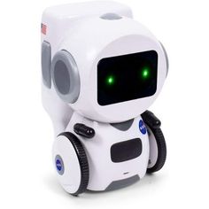 a white robot toy with green eyes